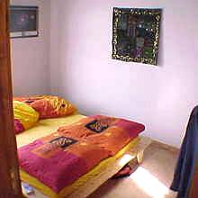 Schlafzimmer mit Doppelbett