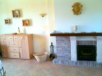 Wohnraum mit Kamin Wohnraum mit Kamin
