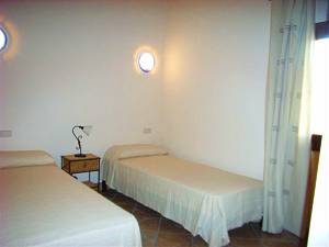 Schlafzimmer mit je 2 Einzelbetten Schlafzimmer mit je 2 Einzelbetten