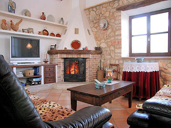 Wohnraum mit Kamin Wohnraum mit Kamin