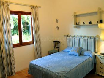 Schlafzimmer mit französischem Bett