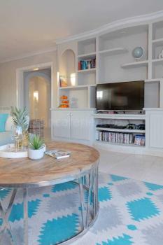 Wohnzimmer der Villa mit Satelliten-TV